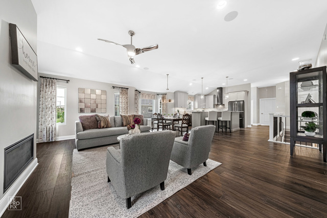 12854 Rosa Lane Lemont, IL 60439 - Photo 7 of 17 a living room with furniture and a view of kitchen