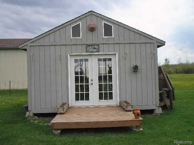 23300 Carleton West Road Belleville, MI 48111 - Photo 11 of 12 Shed With Sitting Room