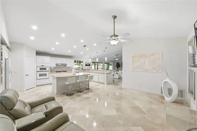 a spacious bathroom with a double vanity sink and a mirror