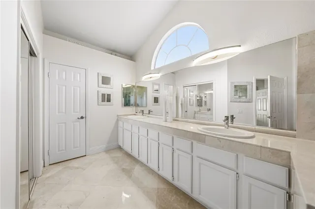 a bedroom with a bed and gym equipment