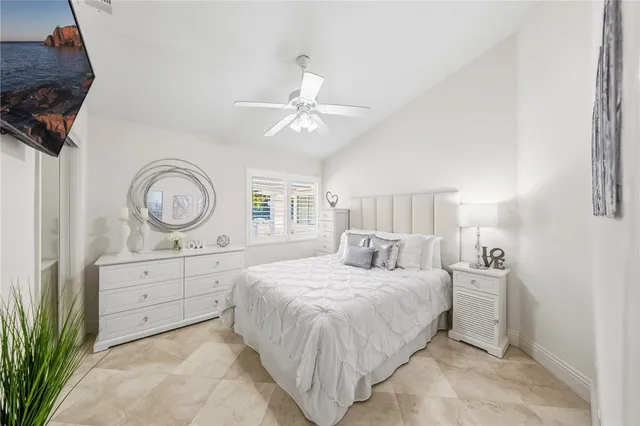 a view of a house with backyard porch and sitting area