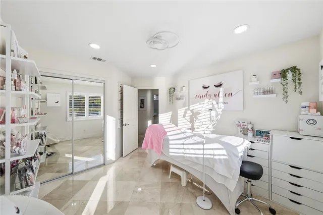 a room with lots of tables and chairs