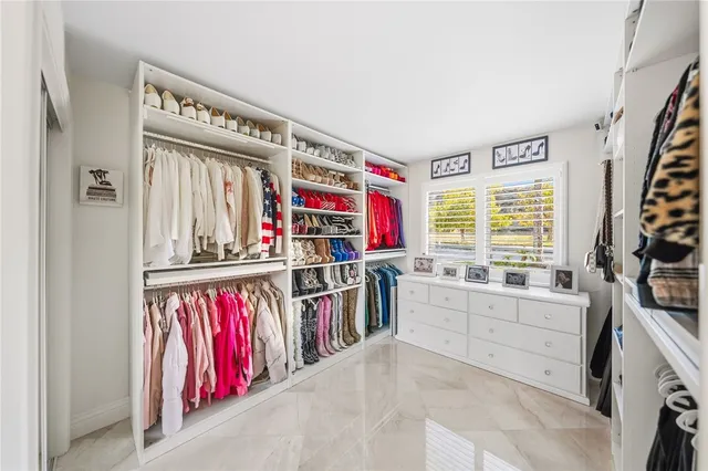 a room with lots of table and chairs