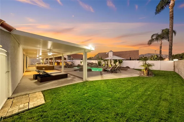 a view of a hallway with a black white checkered floor