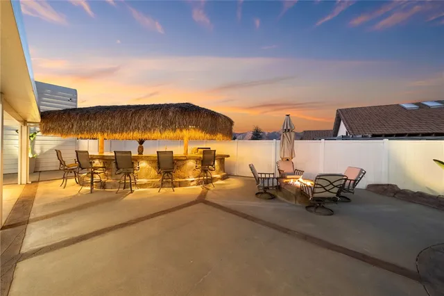 an aerial view of a house with a swimming pool