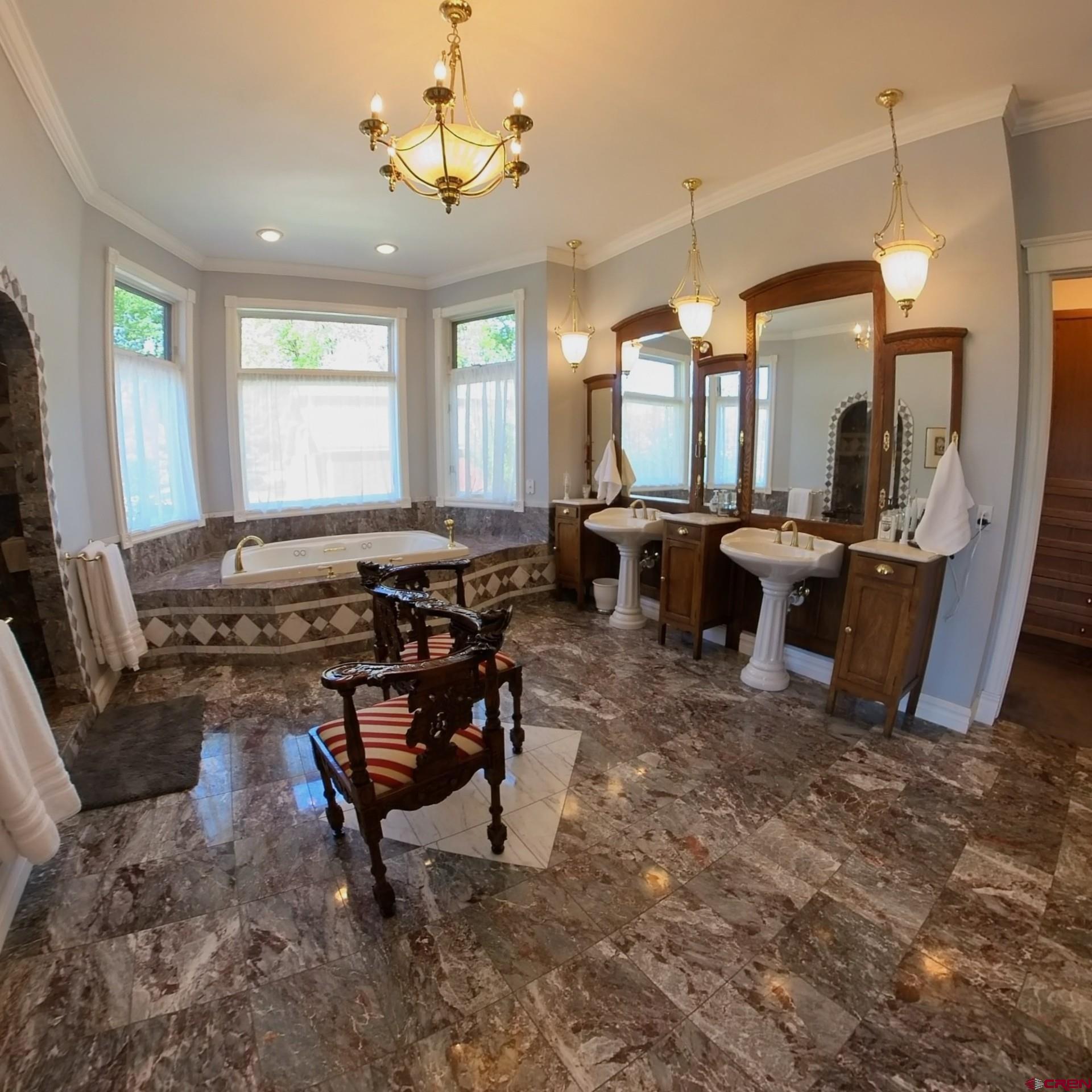 633 East Main Street Cedaredge, CO 81413 - Photo 13 of 32 a living room with furniture and a large window