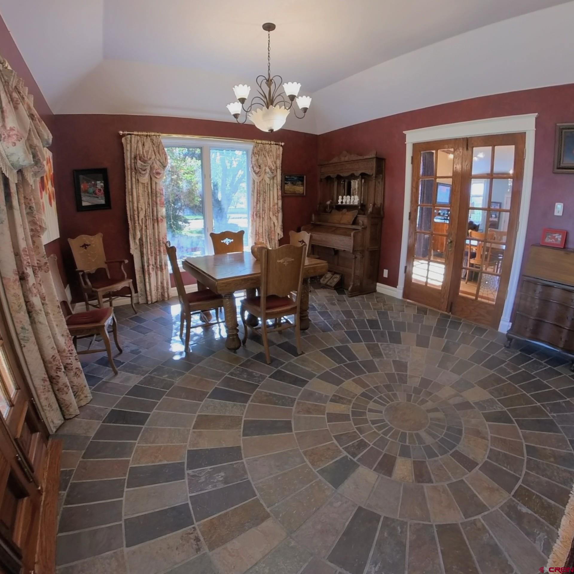633 East Main Street Cedaredge, CO 81413 - Photo 19 of 32 a view of a dining room with furniture window and outside view