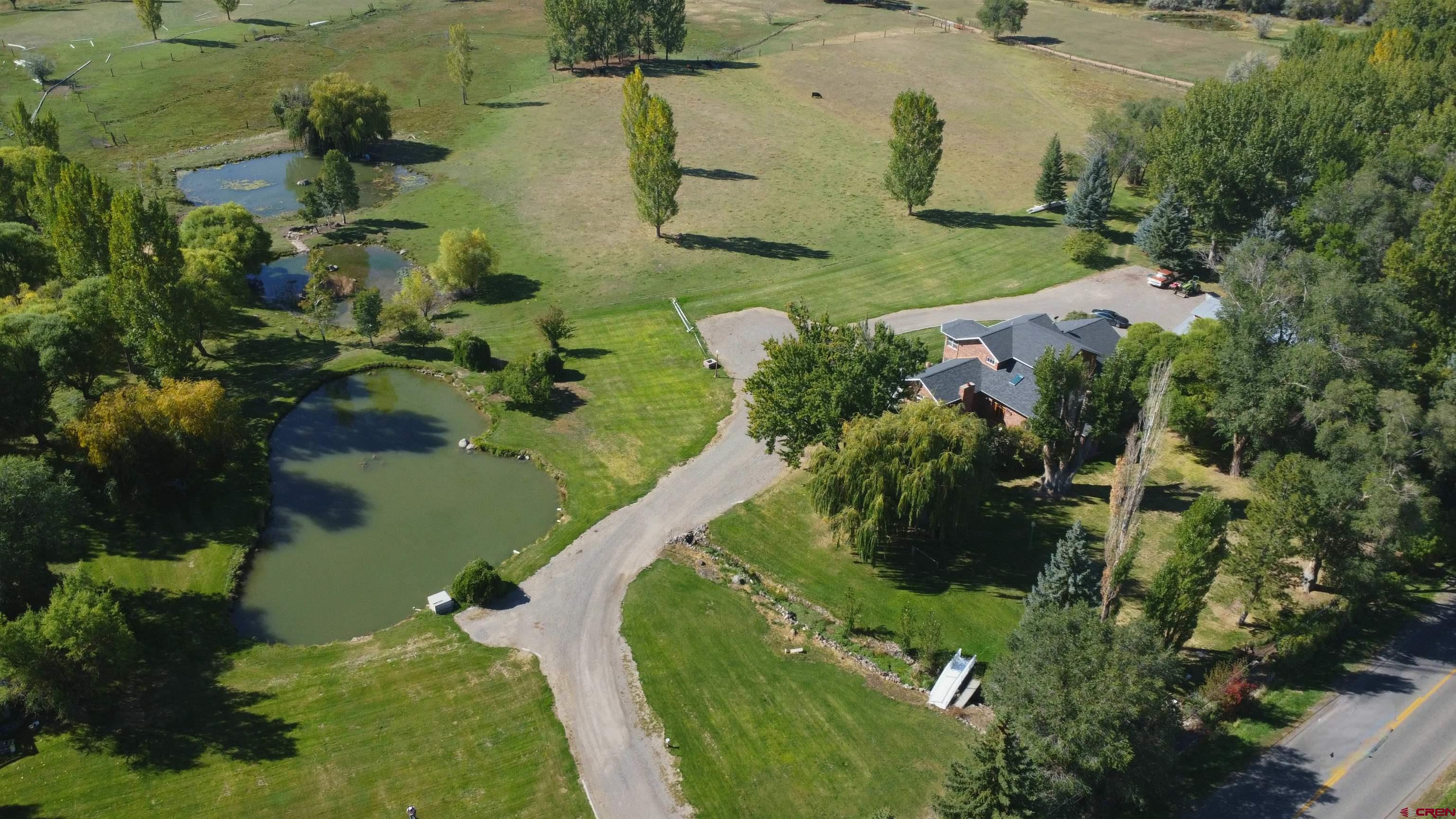 633 East Main Street Cedaredge, CO 81413 - Photo 26 of 32 an aerial view of residential houses with outdoor space