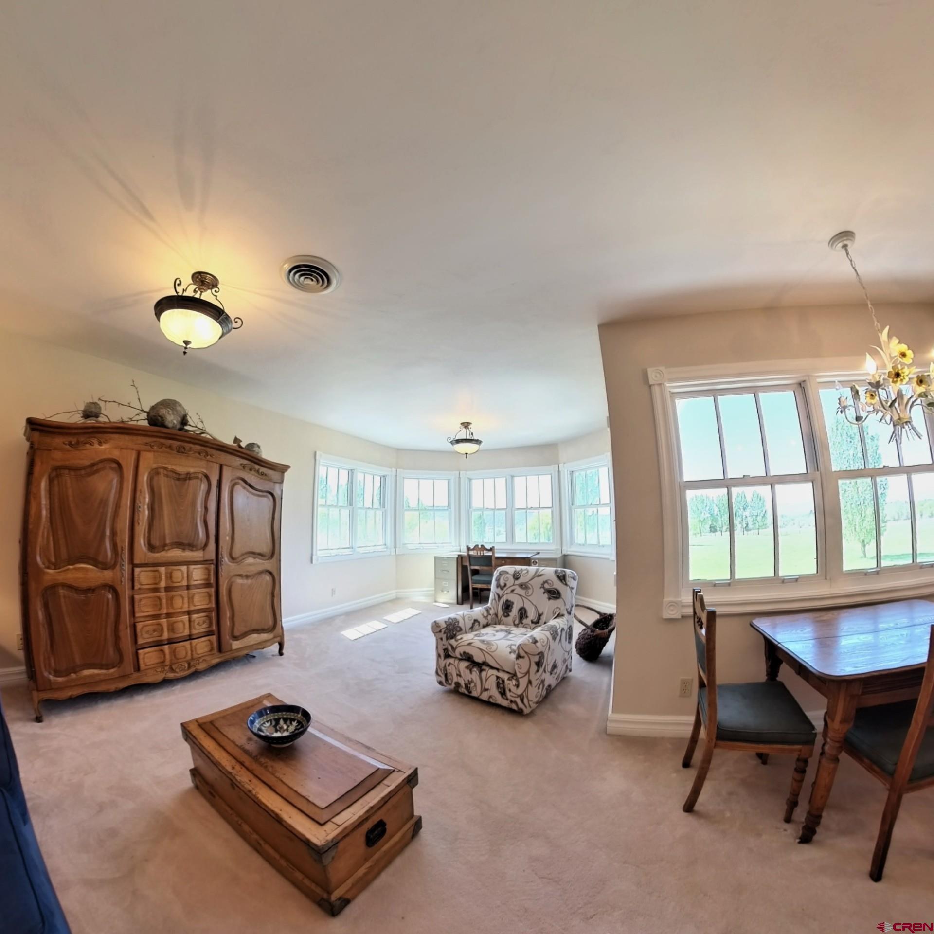 633 East Main Street Cedaredge, CO 81413 - Photo 32 of 32 a living room with furniture and a window
