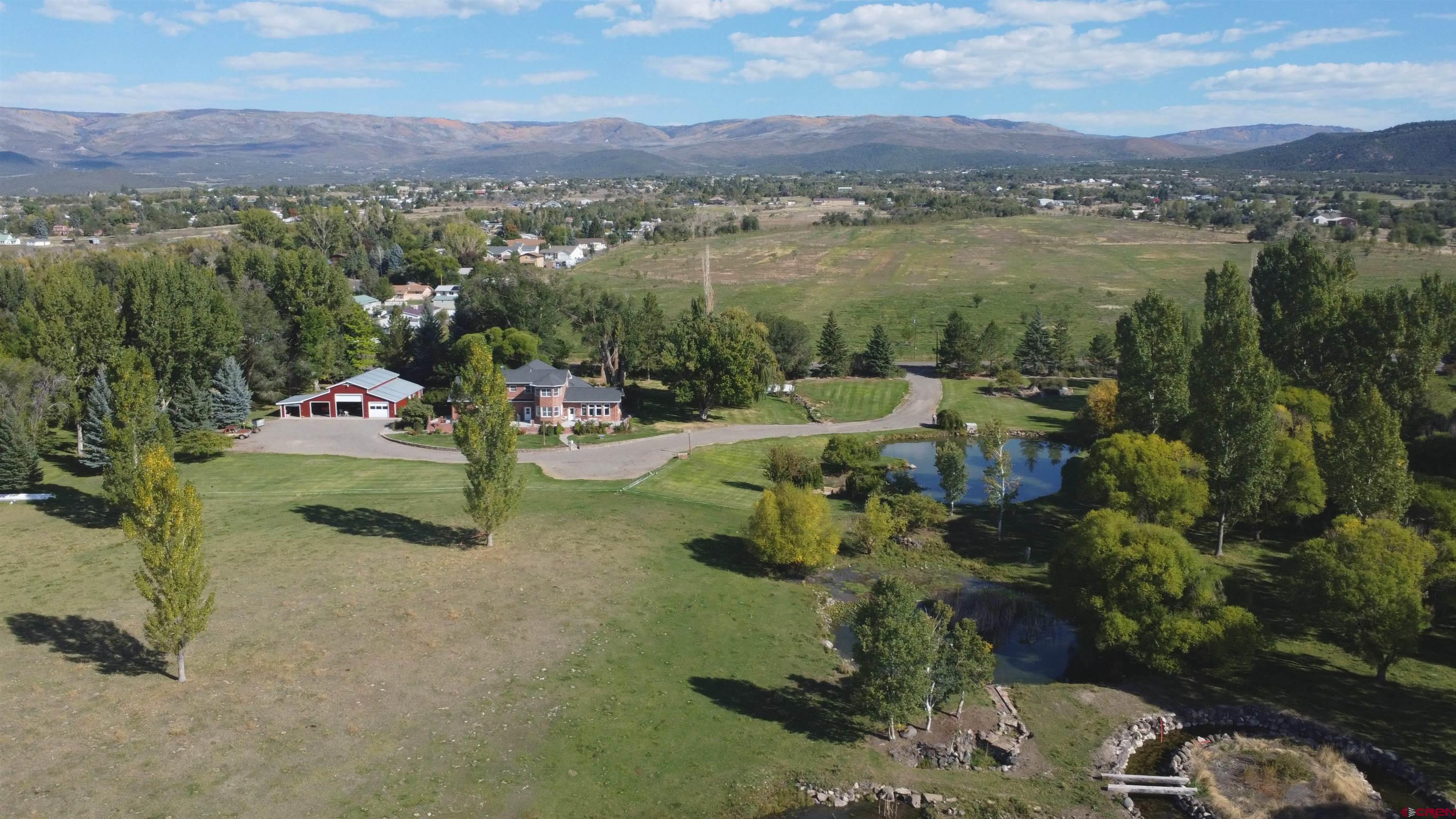 633 East Main Street Cedaredge, CO 81413 - Photo 6 of 32 a picture of city view with lake view