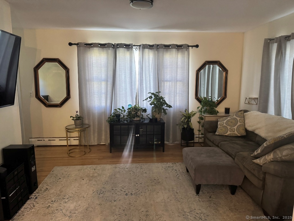 1166 Spindle Hill Road Wolcott, CT 06716 - Photo 11 of 29 a living room with furniture