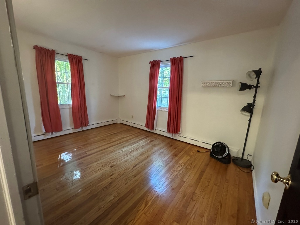 1166 Spindle Hill Road Wolcott, CT 06716 - Photo 14 of 29 a view of a room with gym equipment