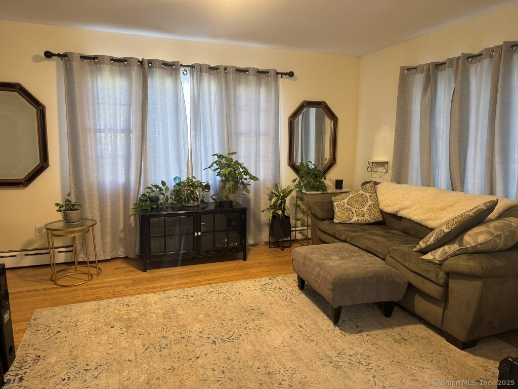 1166 Spindle Hill Road Wolcott, CT 06716 - Photo 10 of 29 a living room with furniture