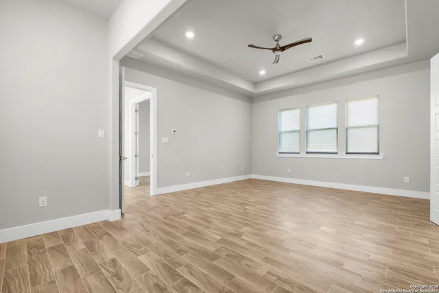 a view of a bathroom with a sink and mirror