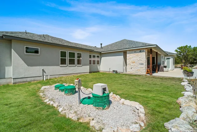 a view of a yard with an outdoor space