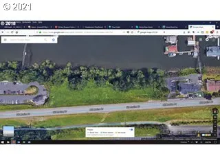 a view of swimming pool with a yard