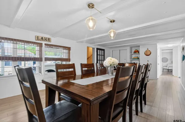 a kitchen with granite countertop a sink and cabinets
