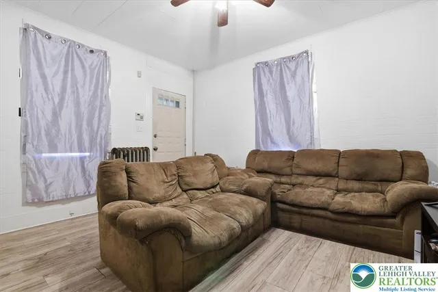 a living room with furniture and a couch