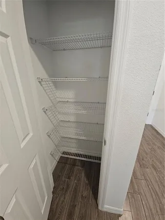 a view of a car park on the side of a building