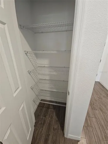 a view of a car park on the side of a building