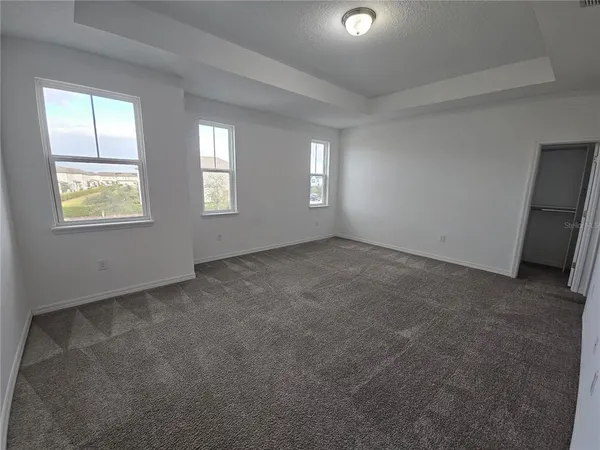 a bathroom with a double vanity sink and mirror