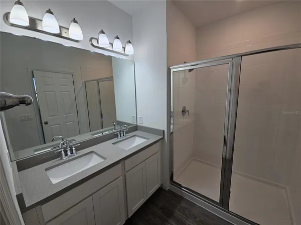 a view of storage and utility room with empty racks