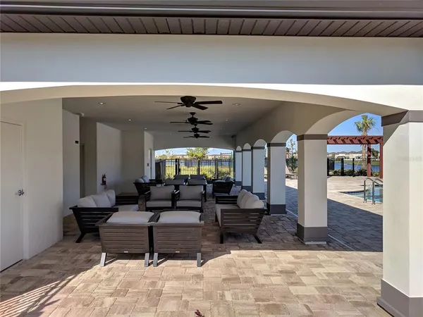a view of a living room and kitchen