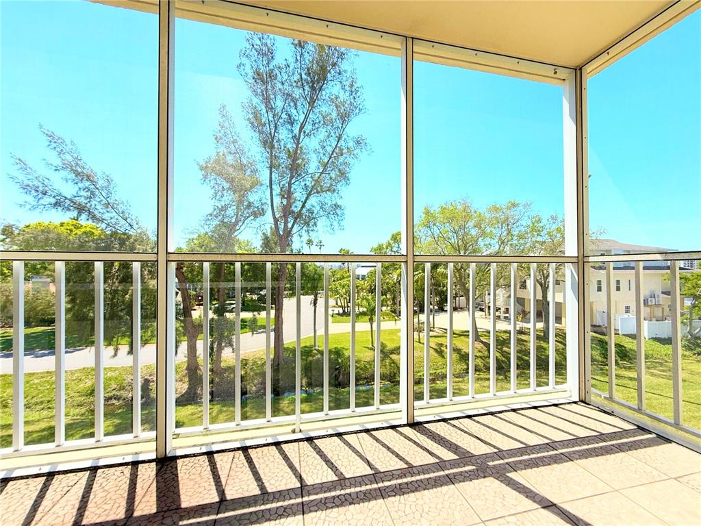 9000 Commodore Drive, Unit 302 Seminole, FL 33776 - Photo 19 of 21 a view of a balcony