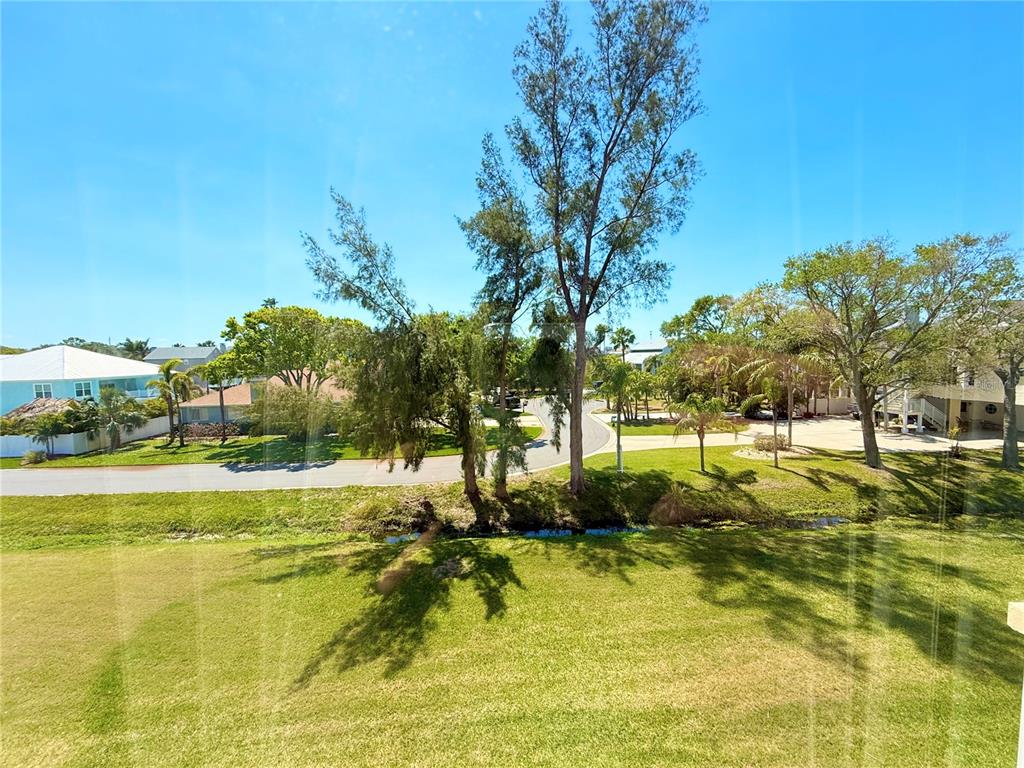 9000 Commodore Drive, Unit 302 Seminole, FL 33776 - Photo 20 of 21 a view of an ocean view