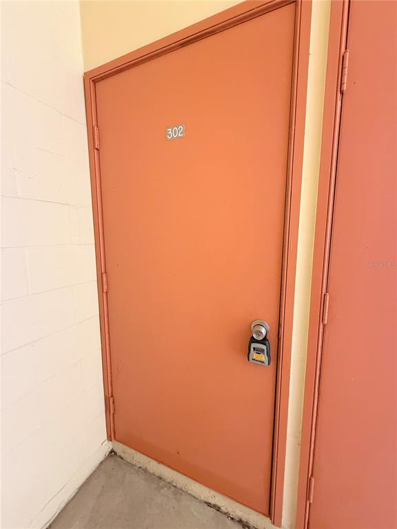 9000 Commodore Drive, Unit 302 Seminole, FL 33776 - Photo 21 of 21 a bathroom with a shower