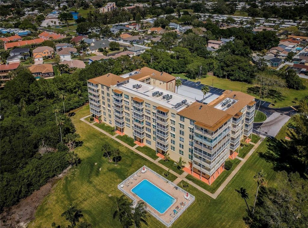 9000 Commodore Drive, Unit 302 Seminole, FL 33776 - Photo 3 of 21 an aerial view of a city