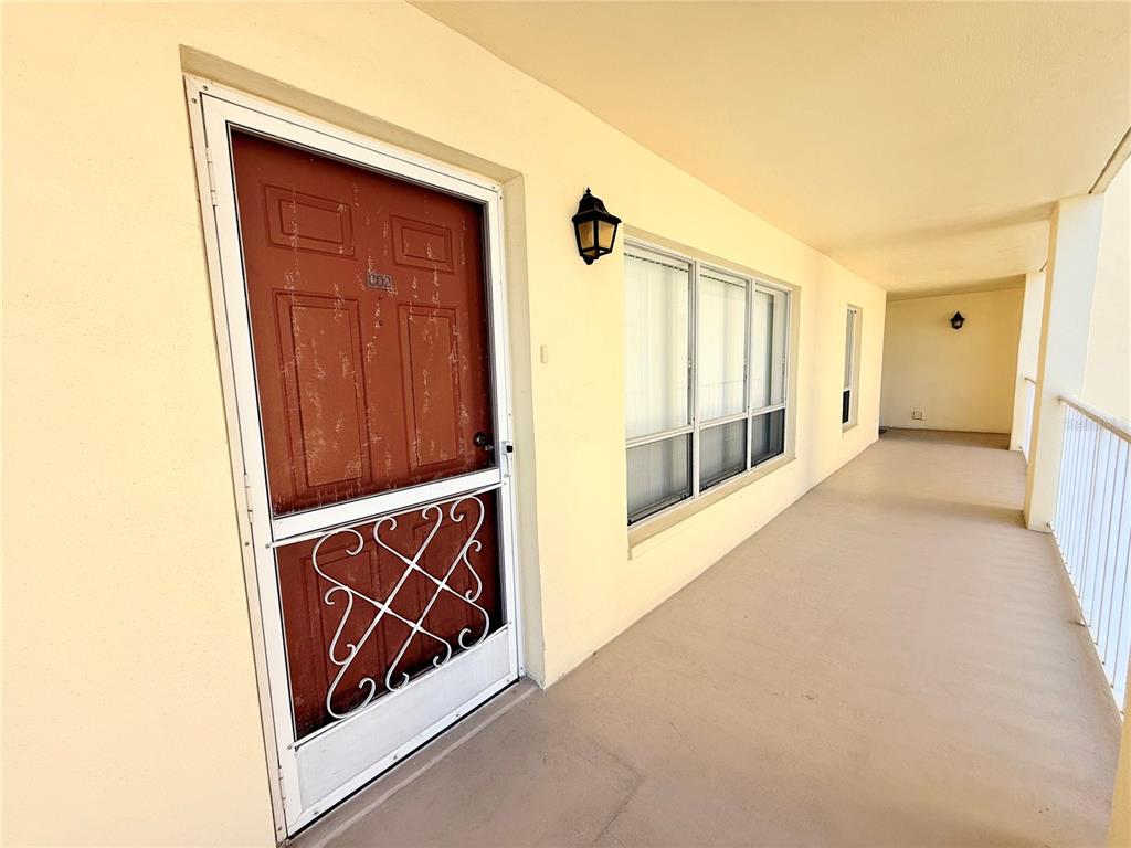 9000 Commodore Drive, Unit 302 Seminole, FL 33776 - Photo 6 of 21 a view of front door
