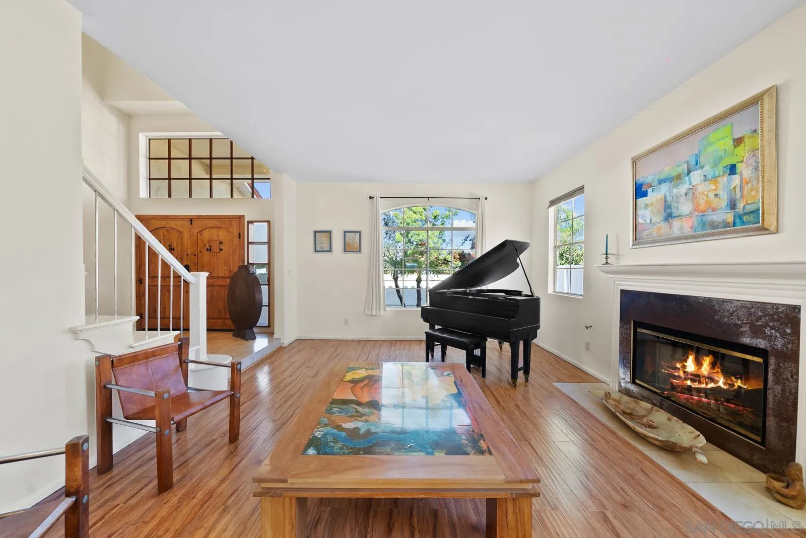 308 Crestview Drive Bonita, CA 91902 - Photo 15 of 37 a living room with furniture fireplace and wooden floor