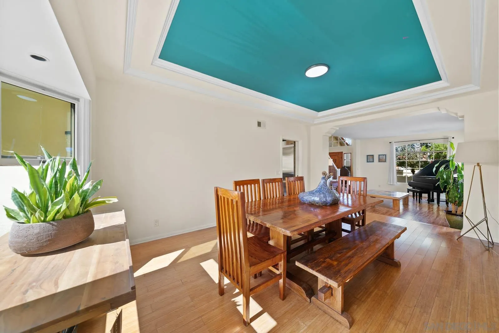 308 Crestview Drive Bonita, CA 91902 - Photo 16 of 37 a dining room with furniture and wooden floor