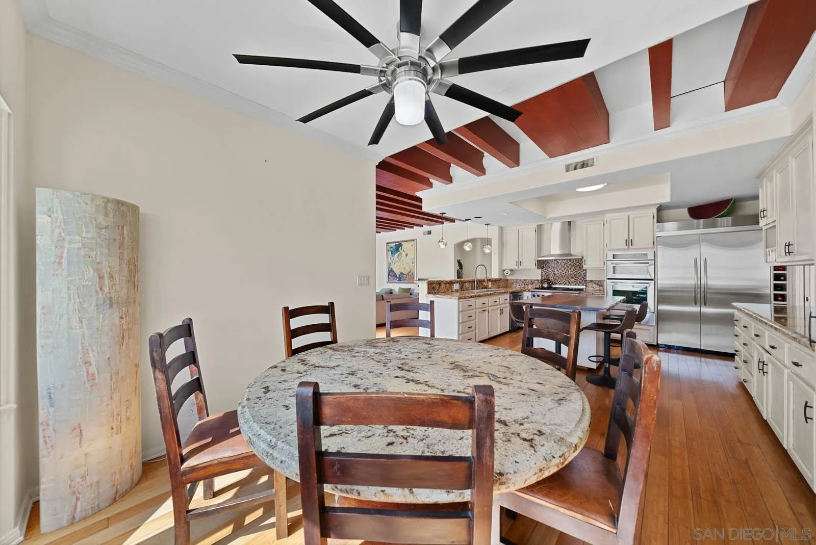 308 Crestview Drive Bonita, CA 91902 - Photo 20 of 37 a view of a dining room with furniture and wooden floor