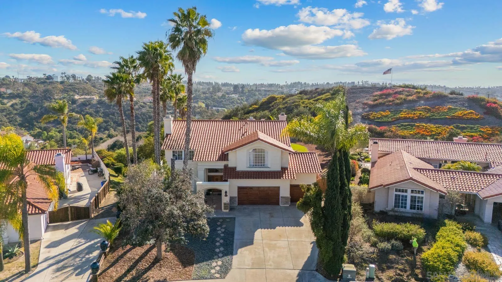 308 Crestview Drive Bonita, CA 91902 - Photo 2 of 37 a front view of a house with a yard basket ball court and outdoor seating