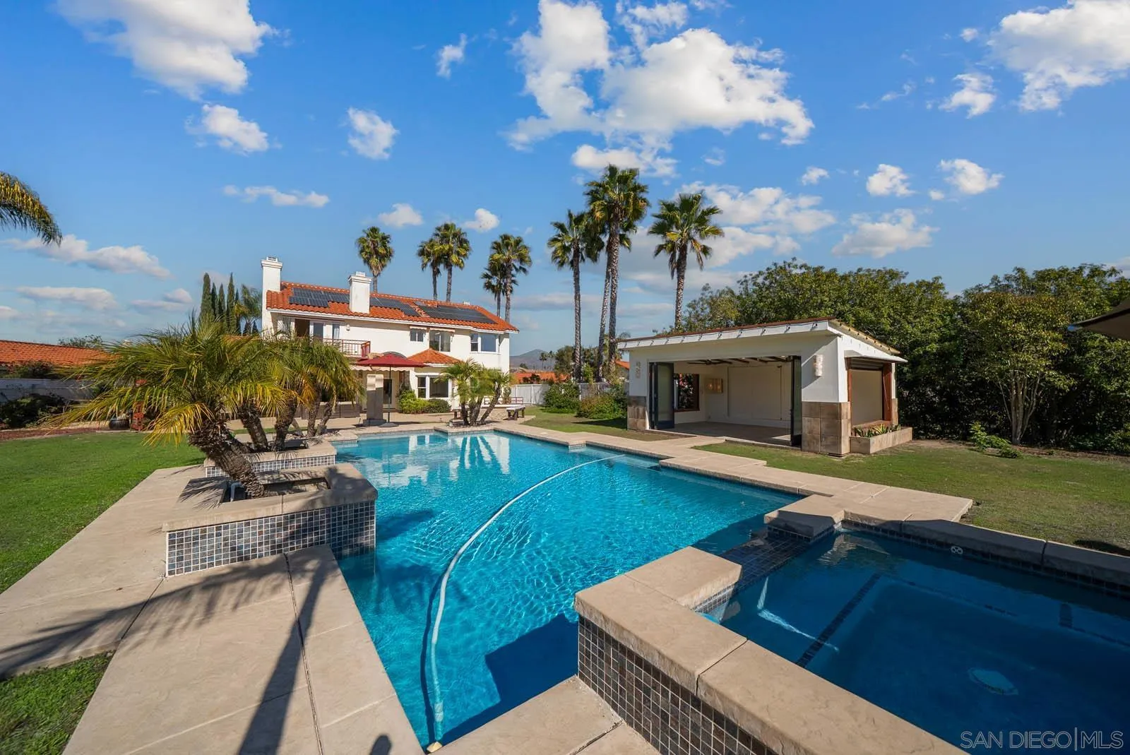 308 Crestview Drive Bonita, CA 91902 - Photo 32 of 37 a view of a house with pool and chairs
