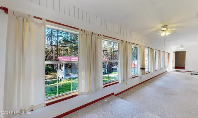 a view of a room with natural light
