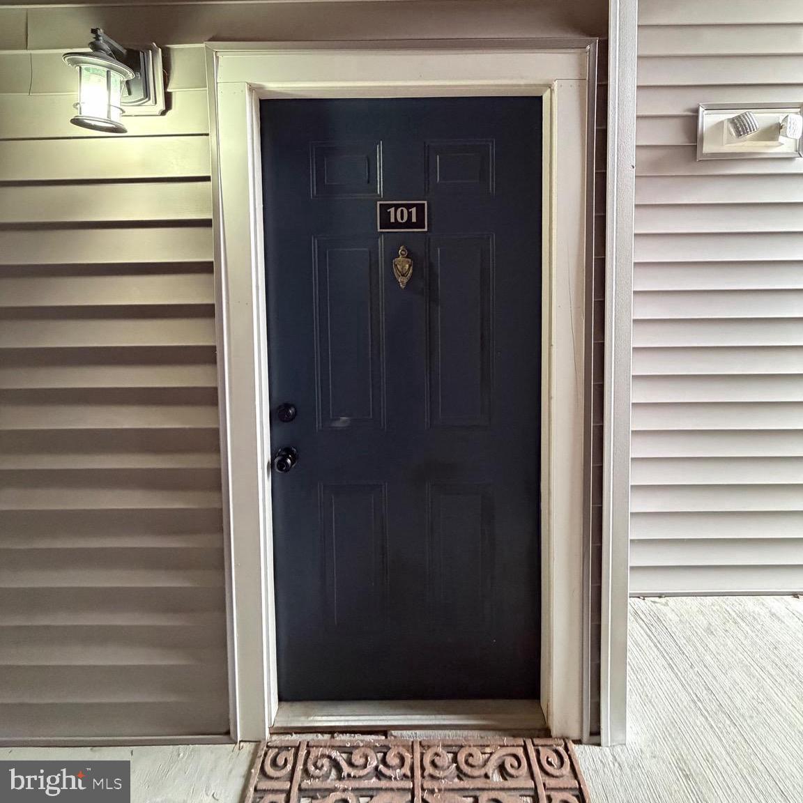 20453 Chesapeake Square, Unit 101 Sterling, VA 20165 - Photo 2 of 51 Front door to your new home!