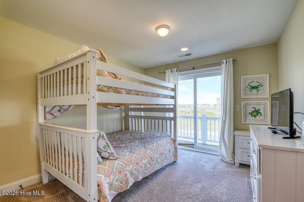 1302 New River Inlet Road North Topsail Beach, NC 28460 - Photo 5 of 22 The Greenwood Bedroom 2 View