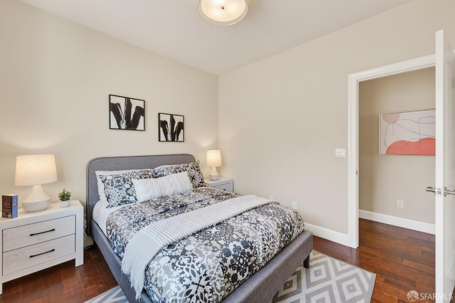 360 Gerald Circle Milpitas, CA 95035 - Photo 22 of 46 a bedroom with a bed and wooden floor