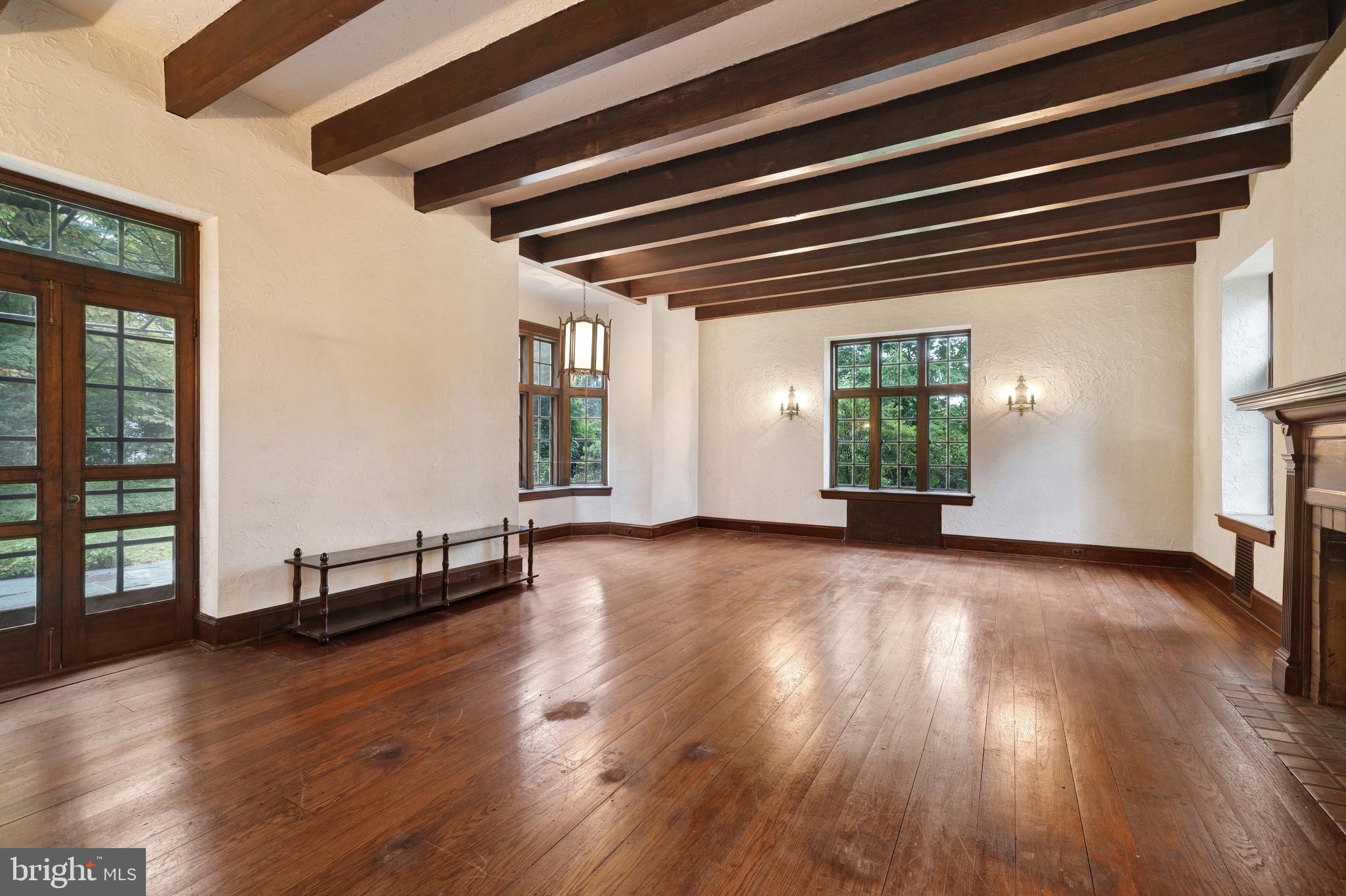 1356 Barrowdale Road Jenkintown, PA 19046 - Photo 6 of 35 an empty room with wooden floor and windows
