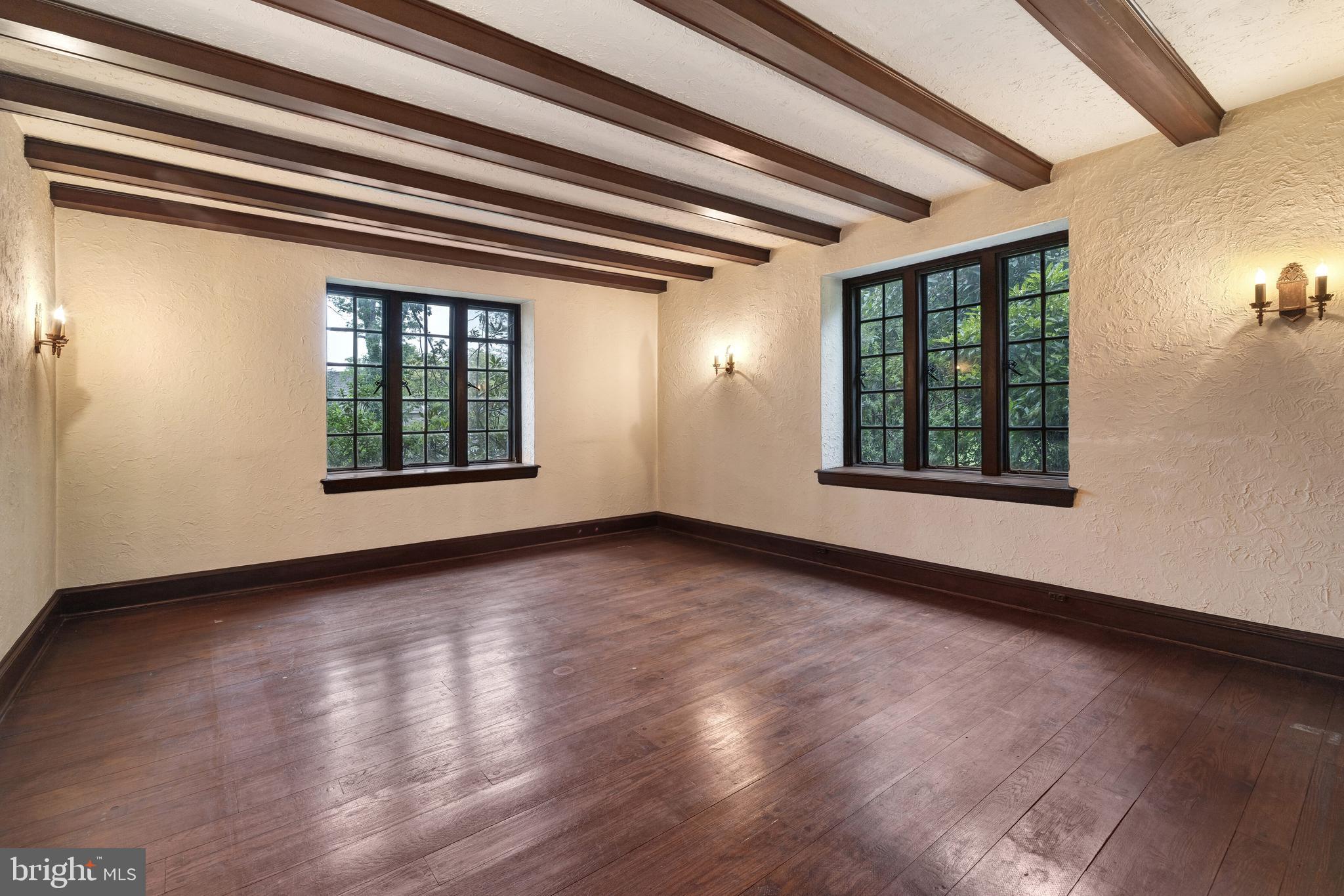 1356 Barrowdale Road Jenkintown, PA 19046 - Photo 8 of 35 an empty room with wooden floor and windows