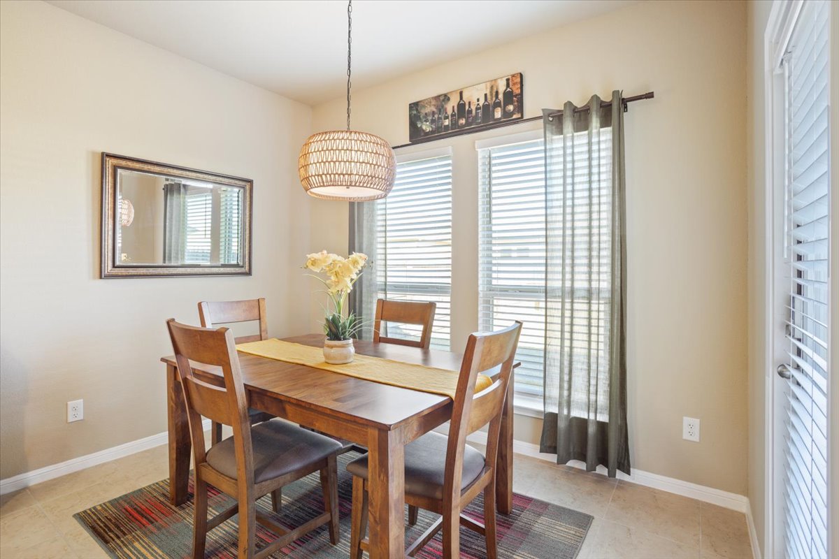 1149 Spring Terrace Loop Temple, TX 76502 - Photo 11 of 25 Welcoming dining space just off the kitchen, ideal for family meals and entertaining guests.