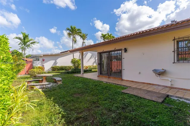 a view of a porch with a backyard
