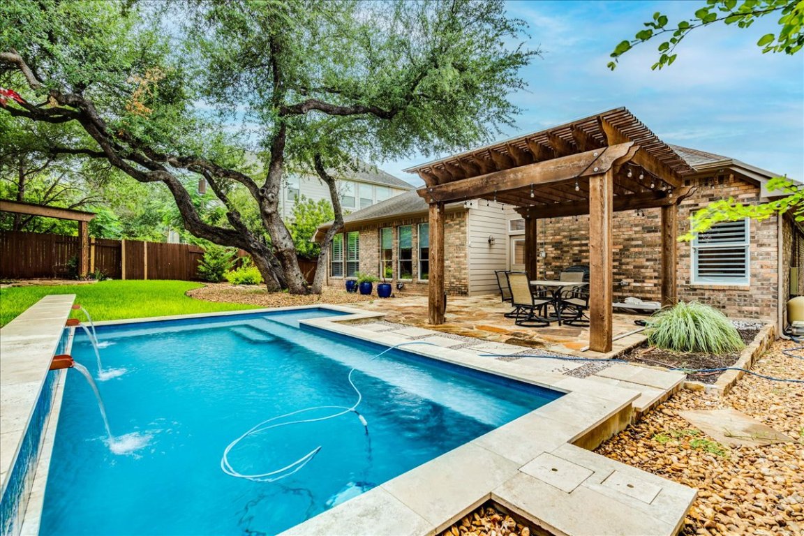 6925 Via Correto Drive Austin, TX 78749 - Photo 1 of 1 swimming pool view with a seating space