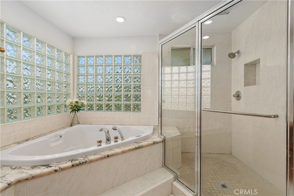 8405 Eastbrook Court Riverside, CA 92504 - Photo 36 of 49 Primary Bathroom Glass Shower & Tub