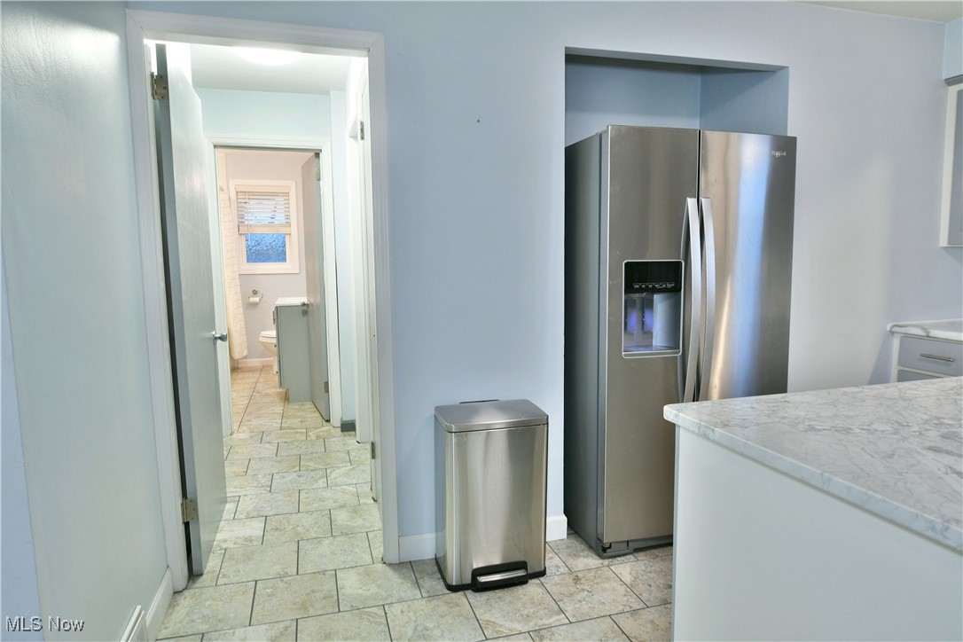 4335 Crew Hood Road Girard, OH 44420 - Photo 19 of 50 Kitchen featuring stainless steel fridge