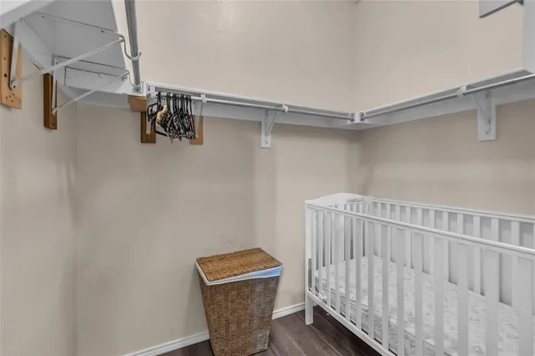 a view of a room with racks on the wall