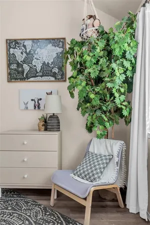 a table with a potted plant and a stove